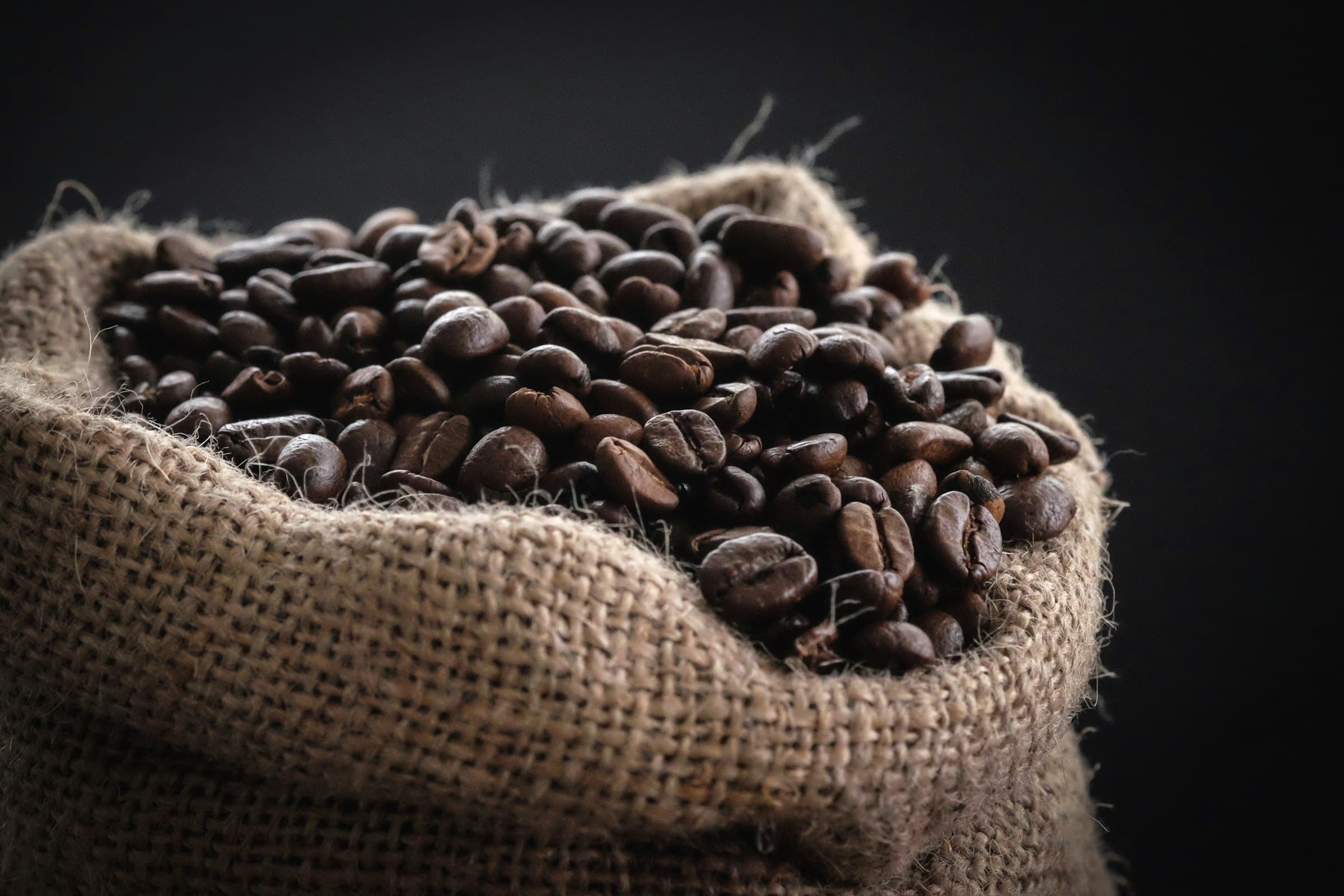 Green coffee beans in export sacks